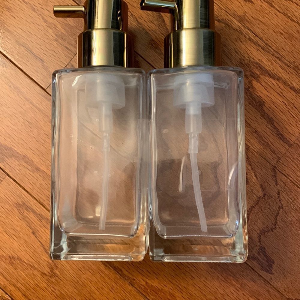 Set of TWO pump bottle refillable dispensers with goldtone tops
